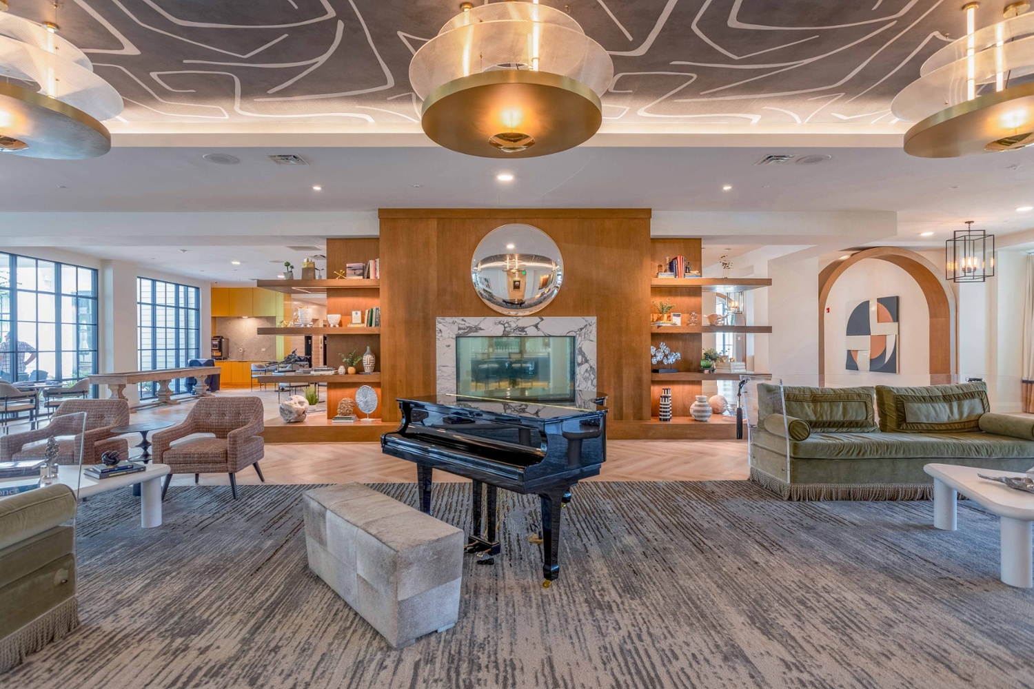 Opus senior living lobby area with piano in the middle